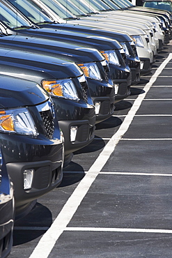 Row of cars in car lot