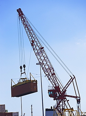 Cranes moving shipping containers