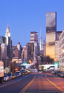 USA, New York State, New York City, city street with skyscrapers in background