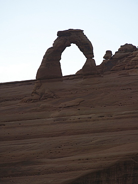 View through rock formation to blue sky