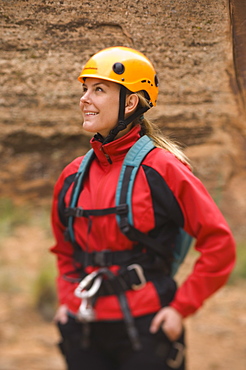 Woman wearing rappelling gear