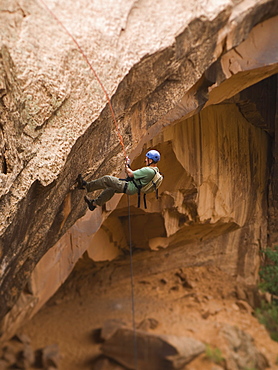 Man canyon rappelling