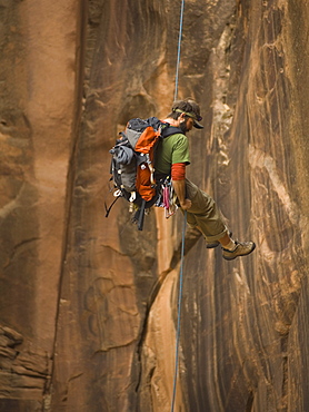 Man canyon rappelling