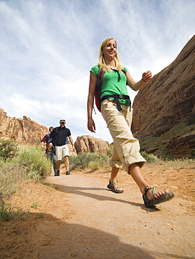 People hiking in desert