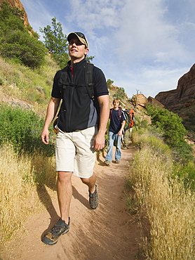 People hiking in desert