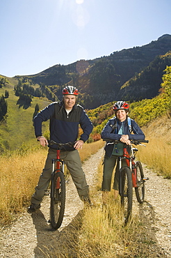 Senior couple on mountain bikes, Utah, United States