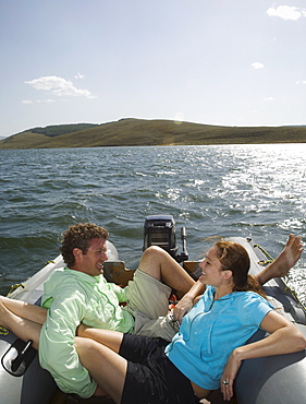 Couple on motorboat, Utah, United States