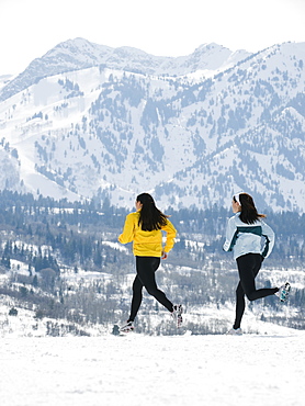 Women running in snow