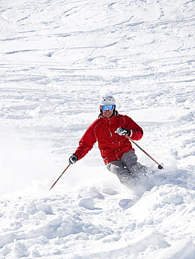 Man skiing downhill