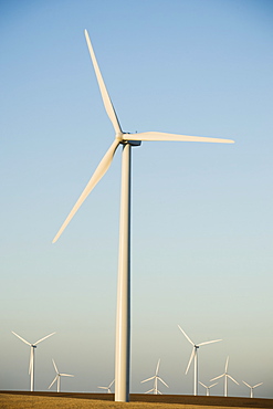 Rows of windmills on wind farm