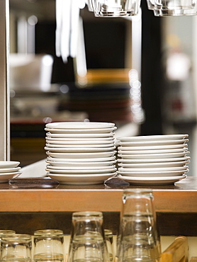 Clean dishes in restaurant