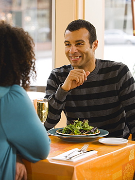 Couple eating in restaurant