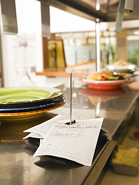 Food order spike in restaurant kitchen