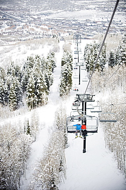 Skiers on a ski lift