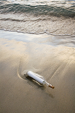 Message in bottle on beach