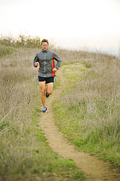 Person running on trail