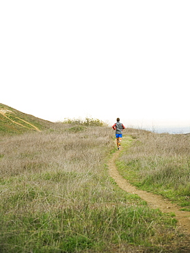 Person running on trail