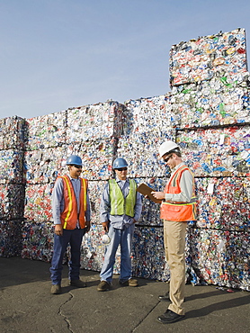 Workers at recycling plant