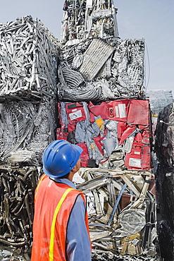 Worker at recycling plant