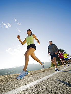 Runners on a road in Malibu