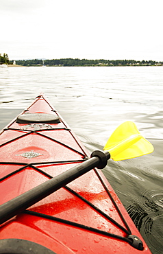 Kayaking on lake, Olympia, Washington, USA