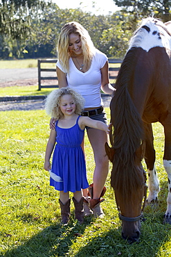 Mother with daughter (4-5) outdoors, Old Wick, New Jersey