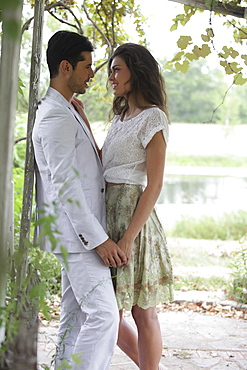 Young couple dating in vineyard, Old Wick, New Jersey