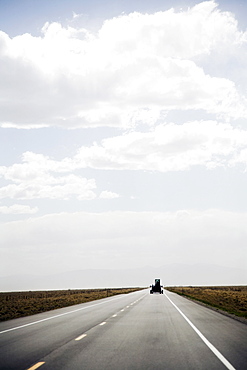 Car on open rural highway, Colorado, USA