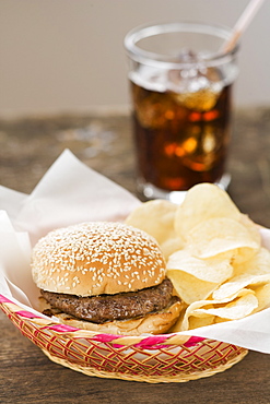 Hamburger and chips in basket