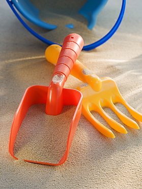 Pail and shovel toys in sand