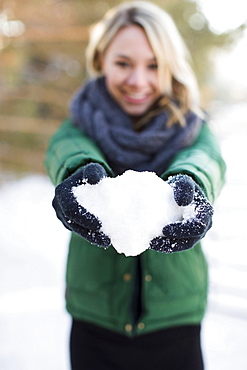 Woman holding snowball