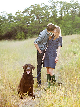 Portrait of young couple with dog, USA, Utah, Salt Lake City