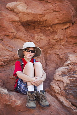 Young boy (10-11) hiking, USA, Utah, Arches National Park, Moab