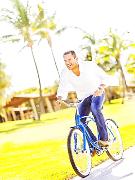 Man riding bike, Jupiter, Florida