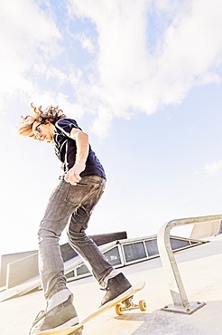 Man skateboarding in skatepark, West Palm Beach, Florida