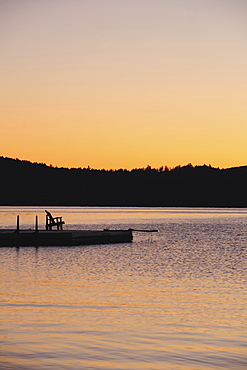 Jetty on lake at dawn, Lake George, New York