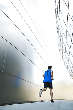 USA, California, Los Angeles, Young man jogging in city, USA, California, Los Angeles