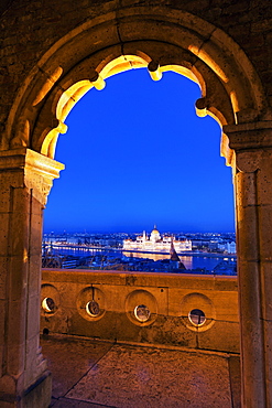 Hungarian Parliament seen through arch of Fisherman's Bastion, Hungary, Budapest, Hungarian Parliament, Fisherman's Bastion