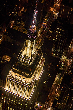 USA, New York, New York City, Aerial view of illuminated Empire State Building at night