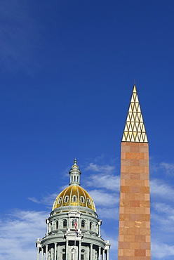 USA, Colorado, Denver, Capitol State building and Veterans monument against blue sky