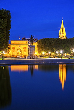 France, Occitanie, Montpellier, Porte du Peyrou and St. Anne Church at dusk