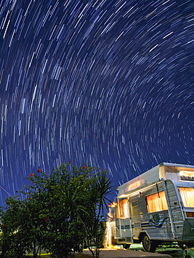 Australia, Queensland, Night sky over camper trailer