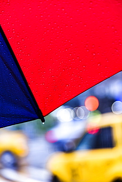 Close up of umbrella on rainy day