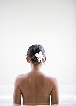 Rear view of woman in spa