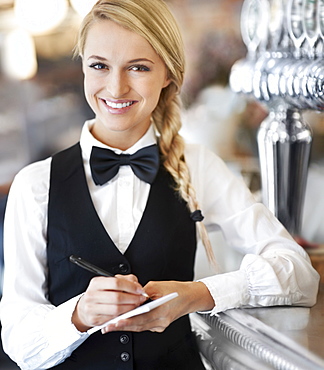 Portrait of smiling waitress