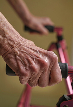 Close up of hands of senior woman on mobility walker