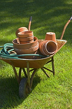 Wheelbarrow and gardening tools