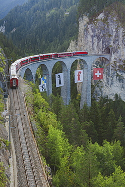 Switzerland, Schmitten and Filisur Landwasser Viaduct, Train on bridge in mountains