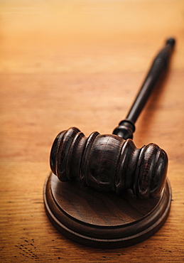 Gavel on wooden background