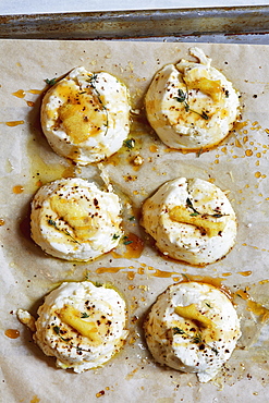 Baked ricotta cheese on baking sheet